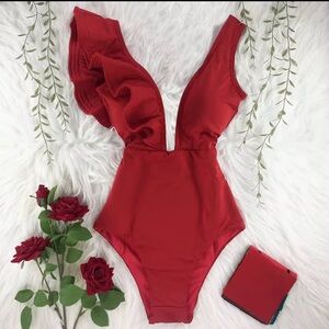 Red one piece swimsuit with ruffles